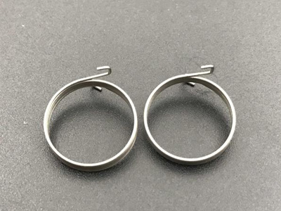 Electric tool torsion spring